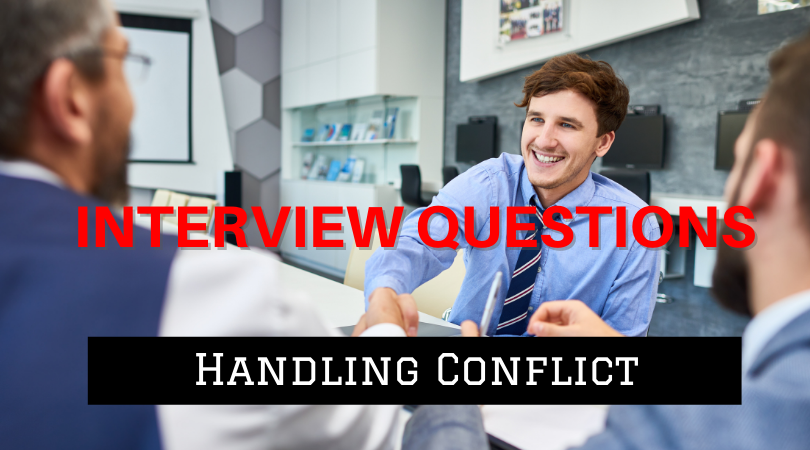 A photo of 3 men in business clothes. One of them is facing the camera, the others have their backs to it. The man facing the camera is smiling and shaking hands with the man on the left. Overlaying the photo are the words: Interview Questions Handling Conflict